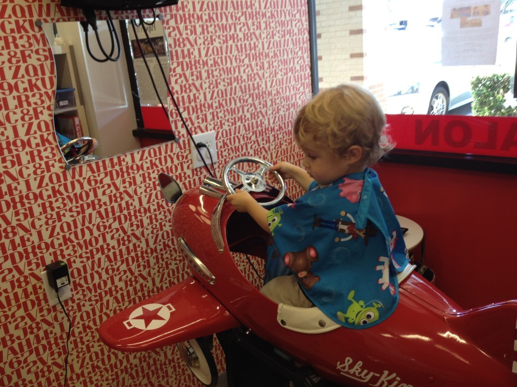 Getting a haircut at Kidville Dallas