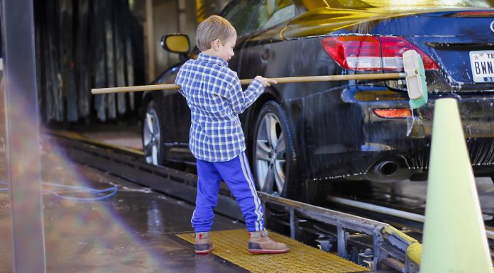 kid washing car