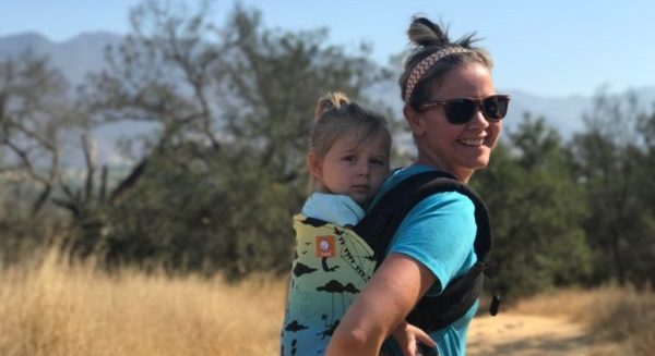 woman wearing toddler on her back, babywearing toddler, toddlerwearing