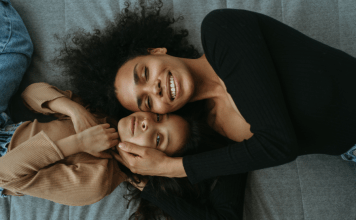 Mom and daughter cuddle