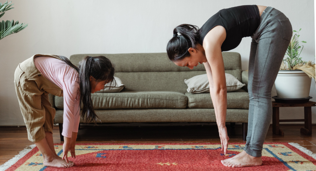 mother and child doing yoga, teaching mindfulness