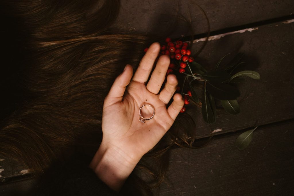 hand holding wedding ring, lessons from divorce