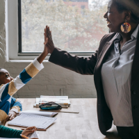 child giving teacher a high five