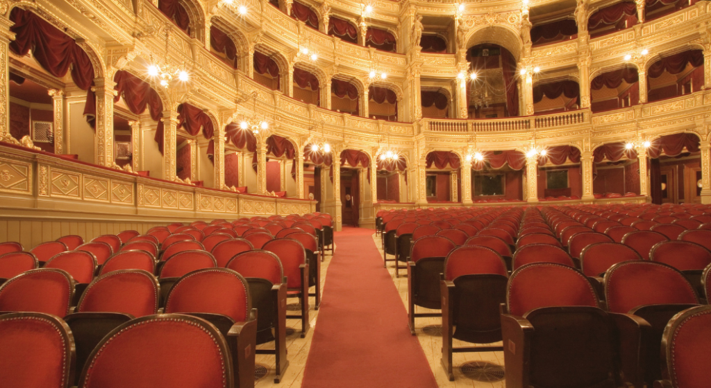 view of an empty, fancy theater from the stage