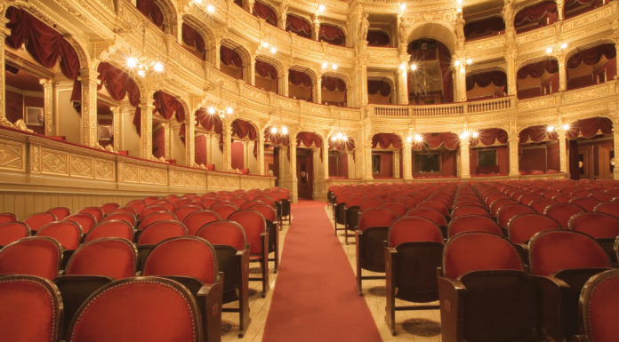 view of an empty, fancy theater from the stage