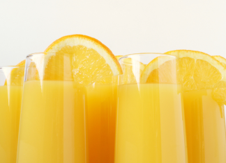 Mimosas with orange slices.