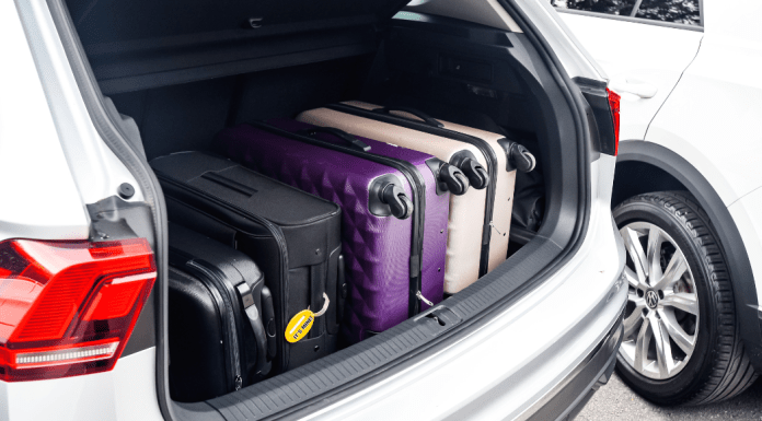 Suitcases in the trunk of a car.