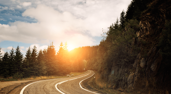 A winding road at sunset.