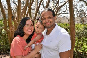 Juliana Shoumbert with her child and partner.