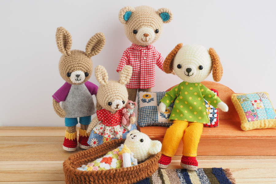 Plush animal family for a toy doll house