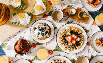 The table is set with brunch foods and drinks for Easter Sunday.