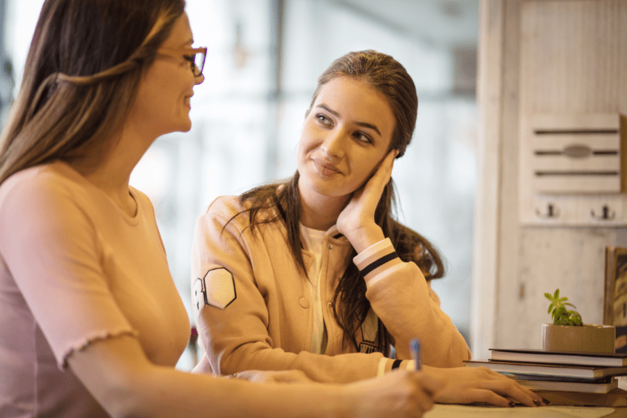 Woman mentors a teen.